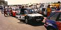A nice candid shot of the MG Maestros waiting in the paddock at Mallory Park 1990. John Bracy is leaning on his roof, Adrian olssen behind and Phil Darbyshire behind him. Me at the back of D129OOE and Malcolm Geddis in blue overalls towards the back of the shot.